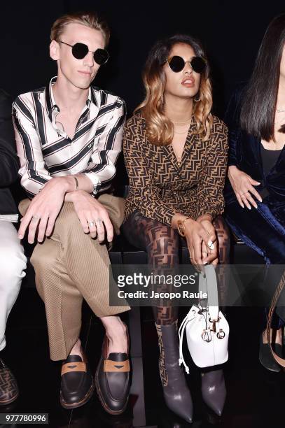 Jamie Campbell Bower and M.I.A. Attend the Fendi show during Milan Men's Fashion Week Spring/Summer 2019 on June 18, 2018 in Milan, Italy.