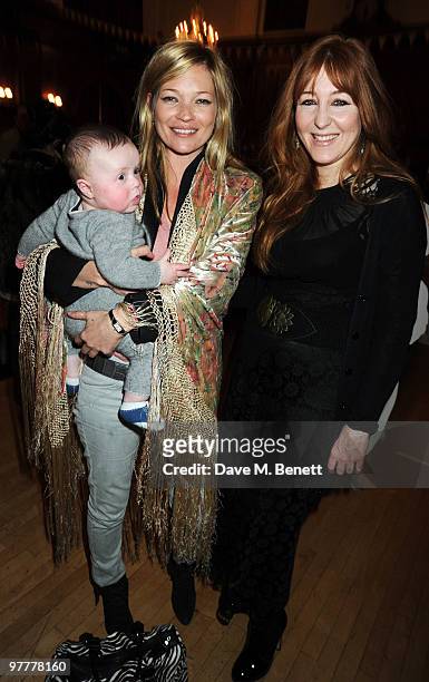 Kate Moss with Charlotte Tilbury and son Flynn attend the launch for Stella McCartney's collection for GAP at the Porchester Hall on March 16, 2010...