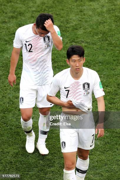 Son Heung-Min of Korea Republic and Kim Min-Woo of Korea Republic look dejected following their sides defeat in the 2018 FIFA World Cup Russia group...
