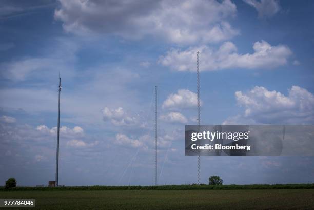 Data transmission towers stand in a field in Maple Park, Illinois, U.S., on Friday, May 25, 2018. In Maple Park, Illinois, traders appear to be...