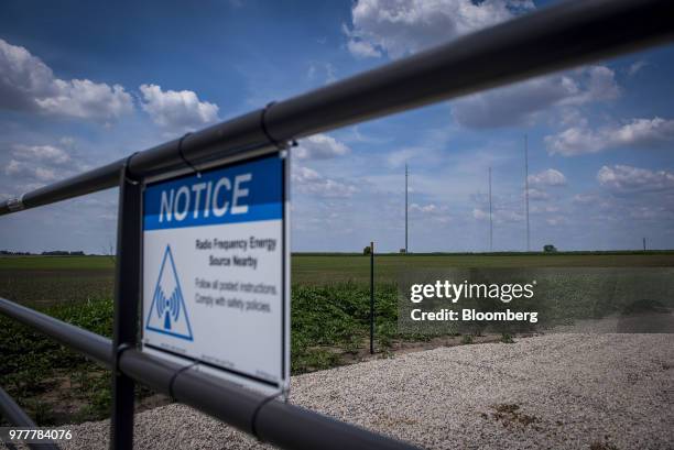 Sign near data transmission towers notes the presence of radio frequency energy nearby in Maple Park, Illinois, U.S., on Friday, May 25, 2018. In...