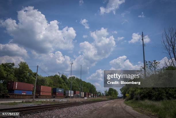 Train passes a data transmission tower in Chicago, Illinois, U.S., on Friday, May 25, 2018. In Maple Park, Illinois, traders appear to be testing the...