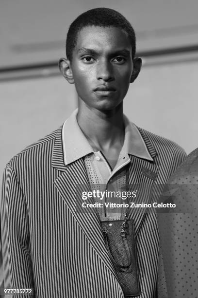 Model is seen backstage ahead of the Fendi show during Milan Men's Fashion Week Spring/Summer 2019 on June 18, 2018 in Milan, Italy.