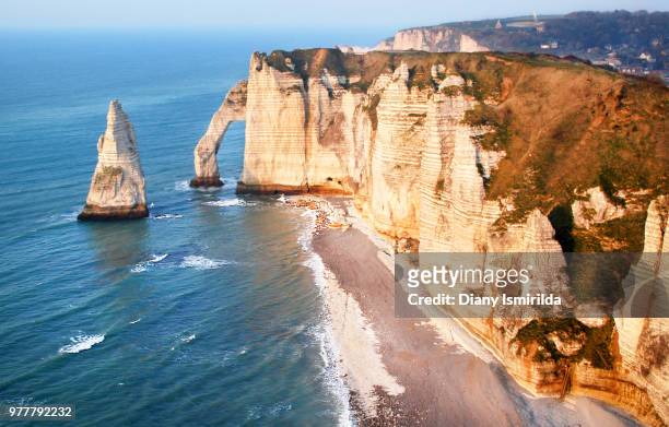 aerial view of mountains by beach, etretat, normandy, france - 諾曼第 個照片及圖片檔