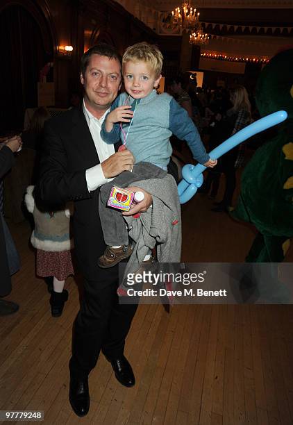 Matthew Freud and son Samson attend the launch for Stella McCartney's collection for GAP at the Porchester Hall on March 16, 2010 in London, England.