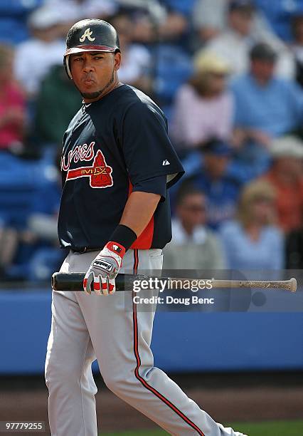 Melky Cabrera of the Atlanta Braves reacts after striking out against the New York Mets at Tradition Field on March 2, 2010 in Port St. Lucie,...