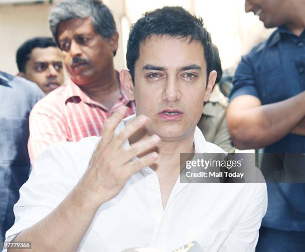 Bollywood actor Aamir Khan celebrates his Birthday with media in Mumbai on March 14, 2010.