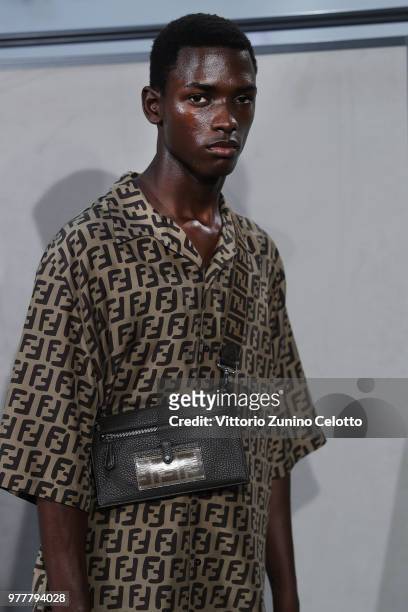 Model is seen backstage ahead of the Fendi show during Milan Men's Fashion Week Spring/Summer 2019 on June 18, 2018 in Milan, Italy.