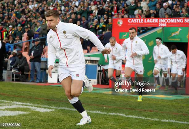 Owen Farrell, the England captain, leads his team on the pitch during the second test match between South Africa and England at Toyota Stadium on...