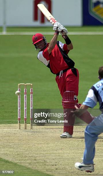 South Australian batsman Greg Blewett sends Shawn Bradstreet to the boundary on his way to 45 in the Mercantile Mutual Cup match between South...