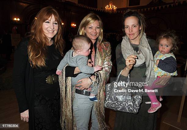 Charlotte Tilbury, Kate Moss, Flynn Tilbury and Bay Garnett attend the launch for Stella McCartney's collection for GAP at the Porchester Hall on...