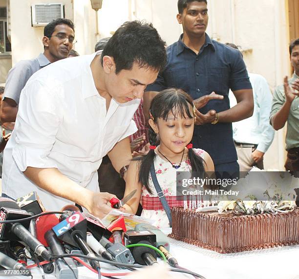 Bollywood actor Aamir Khan celebrates his Birthday with media in Mumbai on March 14, 2010.