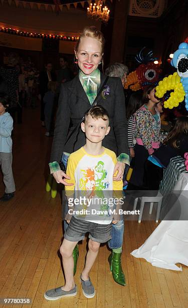 Pippa Brooks with son Joe attend the launch for Stella McCartney's collection for GAP at the Porchester Hall on March 16, 2010 in London, England.