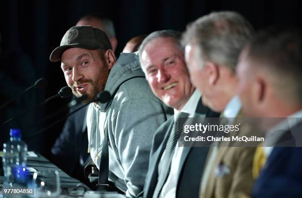 Former Heavyweight world champion Tyson Fury answers questions from the gathered media at Windsor Park on June 18, 2018 in Belfast, Northern Ireland....