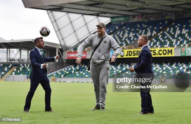 Boxers Carl Frampton, Tyson Fury and Paddy Barnes attend a photo call at Windsor Park on June 18, 2018 in Belfast, Northern Ireland. The three boxers...