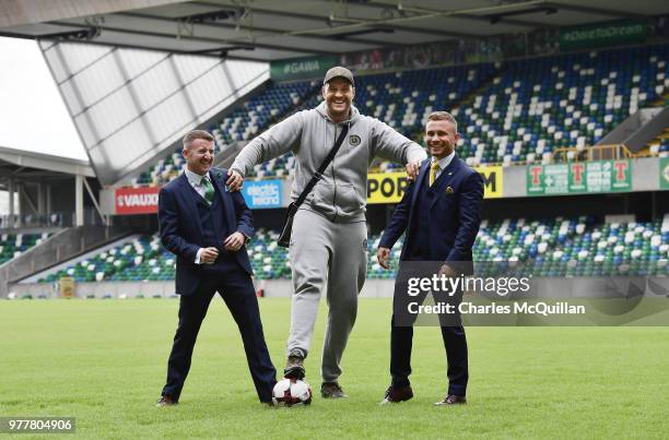 Boxers Carl Frampton, Tyson Fury and Paddy Barnes attend a photo call at Windsor Park on June 18, 2018 in Belfast, Northern Ireland. The three boxers...