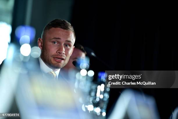 Belfast boxer Carl Frampton answers questions from the gathered media at Windsor Park on June 18, 2018 in Belfast, Northern Ireland. Frampton, Tyson...