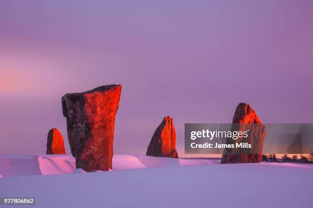 red dawn at nine stones close, derbyshire, uk - surreal landscape stock pictures, royalty-free photos & images