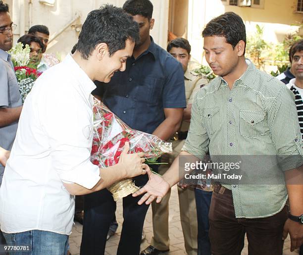 Bollywood actor Aamir Khan celebrates his Birthday with media in Mumbai on March 14, 2010.