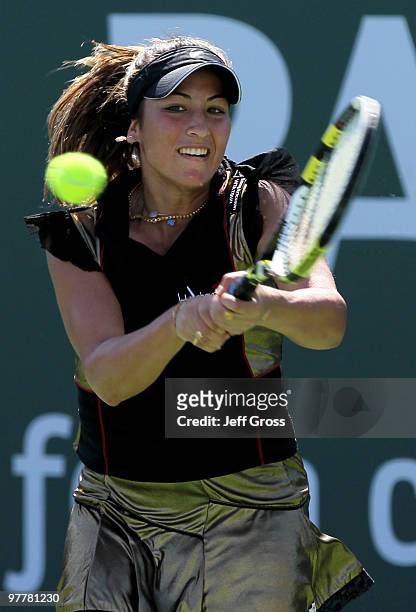 Aravane Rezai of France returns a backhand to Elena Dementieva of Russia during the BNP Paribas Open at the Indian Wells Tennis Garden on March 16,...