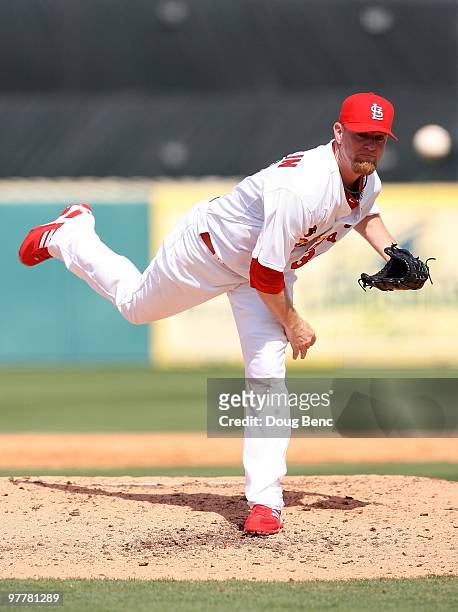 Relief pitcher Ryan Franklin of the St Louis Cardinals pitches against the Washington Nationals at Roger Dean Stadium on March 10, 2010 in Jupiter,...
