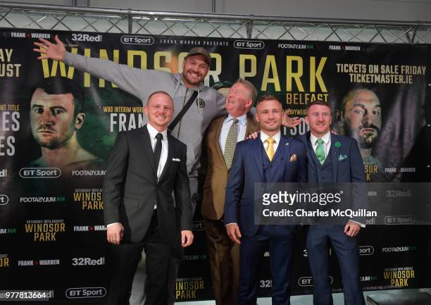 Boxers Carl Frampton, Tyson Fury, Luke Jackson and Paddy Barnes attend a photo call with promoter Frank Warren at Windsor Park on June 18, 2018 in...