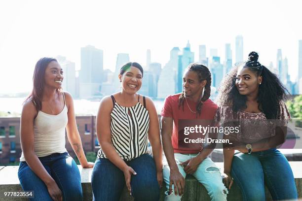 friends on city break in nyc - femininity masculinity stock pictures, royalty-free photos & images