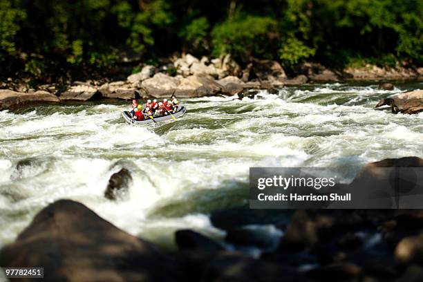 image of rafters in the fayette station rapids on the new river at fayetteville, west virginia. - fayetteville stock pictures, royalty-free photos & images
