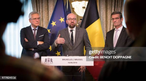 Vice-Prime Minister and Minister of Employment, Economy and Consumer Affairs Kris Peeters and FEB-VBO President Bernard Gilliot look on as Belgian...