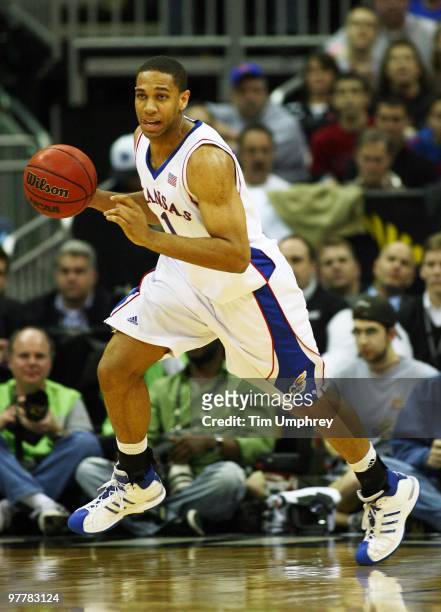 Xavier Henry of the Kansas Jayhawks brings the ball up the court against the Kansas State Wildcats in the 2010 Phillips 66 Big 12 Men's Basketball...
