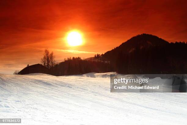 sunset in kirchberg, tirol, austria - kirchberg austria stock pictures, royalty-free photos & images