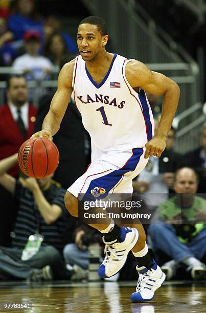 Xavier Henry of the Kansas Jayhawks brings the ball up the court against the Kansas State Wildcats in the 2010 Phillips 66 Big 12 Men's Basketball...