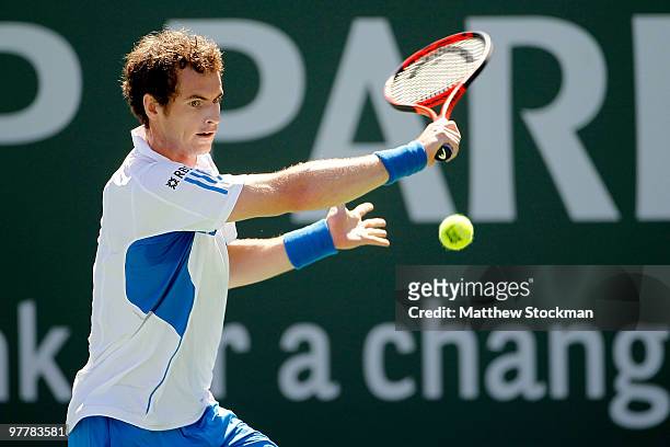 Andy Murray of Great Britain returns a shot to Michael Russell during the BNP Paribas Open on March 16, 2010 at the Indian Wells Tennis Garden in...
