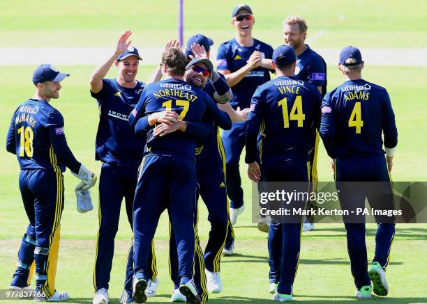 Hampshire's Liam Dawson lifts Sam Northeast as they celebrate the wicket of Yorkshire's Gary Balance with team mates, bowled Berg, caught Northeast...