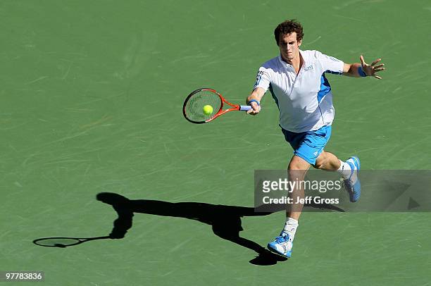 Andy Murray of Great Britain returns a forehand to Michael Russell during the BNP Paribas Open at the Indian Wells Tennis Garden on March 16, 2010 in...