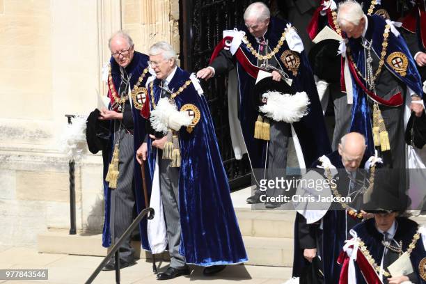 Former British Prime Minister John Major walks down the steps during the Order Of The Garter Service at Windsor Castle on June 18, 2018 in Windsor,...