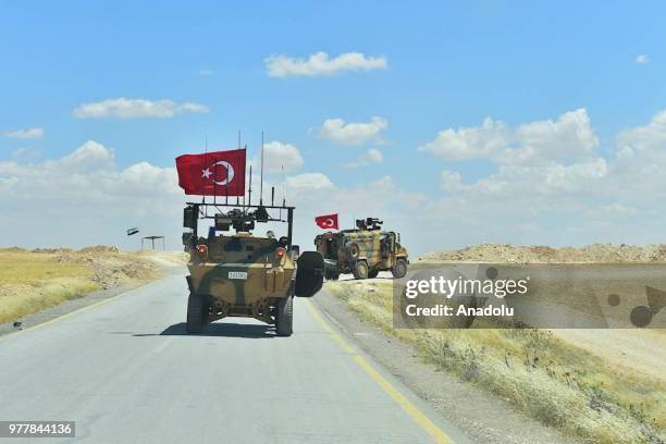 Armoured vehicles of Turkish Armed Forces start to patrol between northern Syrian city of Manbij and Turkey's Operation Euphrates Shield area on June...