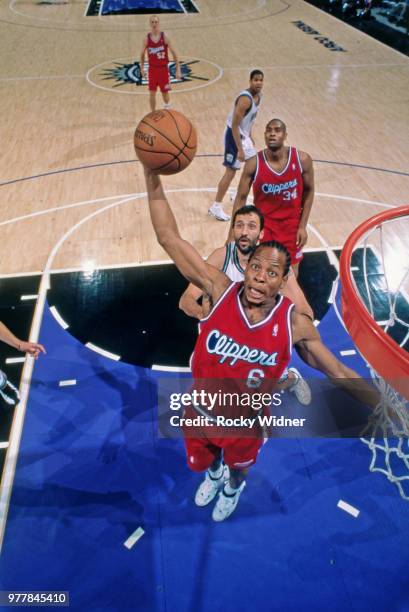 Troy Hudson of the LA Clippers grabs the rebound against the Sacramento Kings on April 29, 1999 at ARCO Arena in Sacramento, California. NOTE TO...