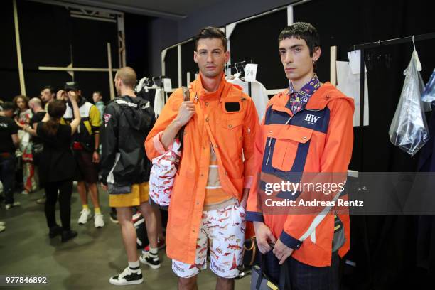 Models are seen backstage ahead of the Hunting World show during Milan Men's Fashion Week Spring/Summer 2019 on June 18, 2018 in Milan, Italy.