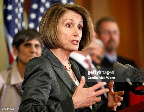 Speaker of the House Rep. Nancy Pelosi speaks as Rep. Rosa DeLauro listens during a news conference March 16, 2010 on Capitol Hill in Washington, DC....