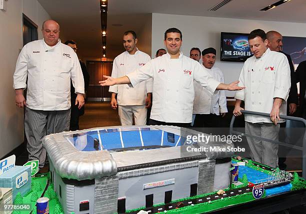 Mauro Castano, Carlos Valastro, Joe Faugno and Remy Gonzalez from TLC's tv program Cake Boss aapresent a cake in honor of the opening of Red Bull...