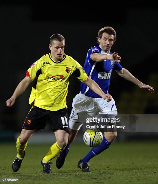 Heidar Helguson of Watford battles with Gareth McAuley of Ipswich during the Coca-Cola Championship match between Watford and Ipswich at Vicarage...