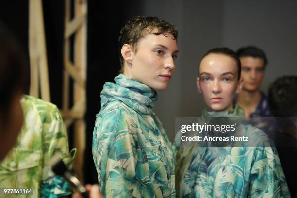 Models are seen backstage ahead of the Hunting World show during Milan Men's Fashion Week Spring/Summer 2019 on June 18, 2018 in Milan, Italy.