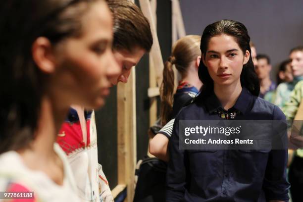 Models are seen backstage ahead of the Hunting World show during Milan Men's Fashion Week Spring/Summer 2019 on June 18, 2018 in Milan, Italy.