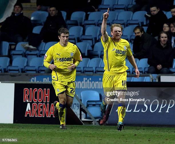 Chris Burke of Cardiff celebrates after his goal during the Coca-Cola Championship match between Coventry City and Cardiff City at The Ricoh Arena on...