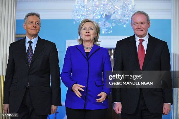 Secretary of State Hillary Clinton makes her way to the Treaty Room to pose for a photo with Northern Ireland First Minister Peter Robinson and...