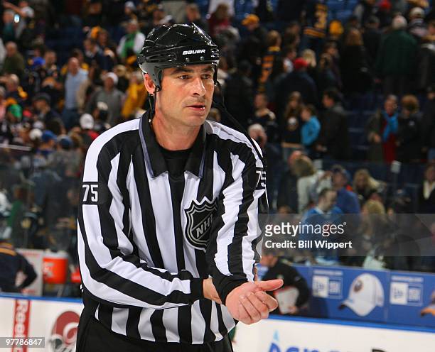 Linesman Derek Amell works a game between the Buffalo Sabres and the Minnesota Wild on March 12, 2010 at HSBC Arena in Buffalo, New York.