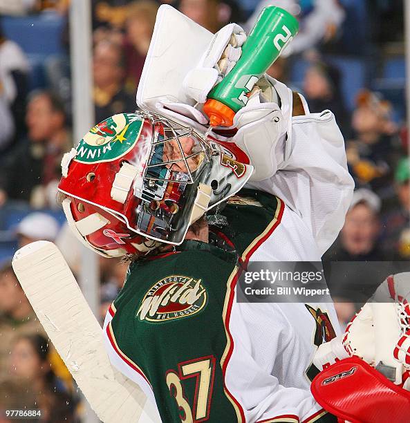 Josh Harding of the Minnesota Wild takes a water break in the game against the Buffalo Sabres on March 12, 2010 at HSBC Arena in Buffalo, New York.