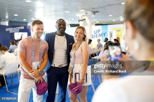 Akon poses with fans during the GABBCON session at the Cannes Lions Festival 2018 on June 18, 2018 in Cannes, France.