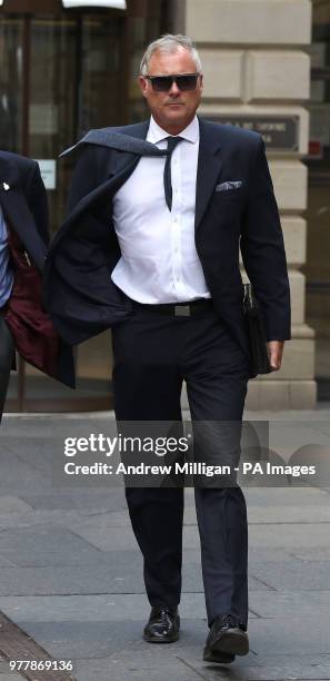 Former TV presenter John Leslie leaves Edinburgh Sheriff Court, he is accused of putting his hand down a woman's trousers as they danced at her hen...